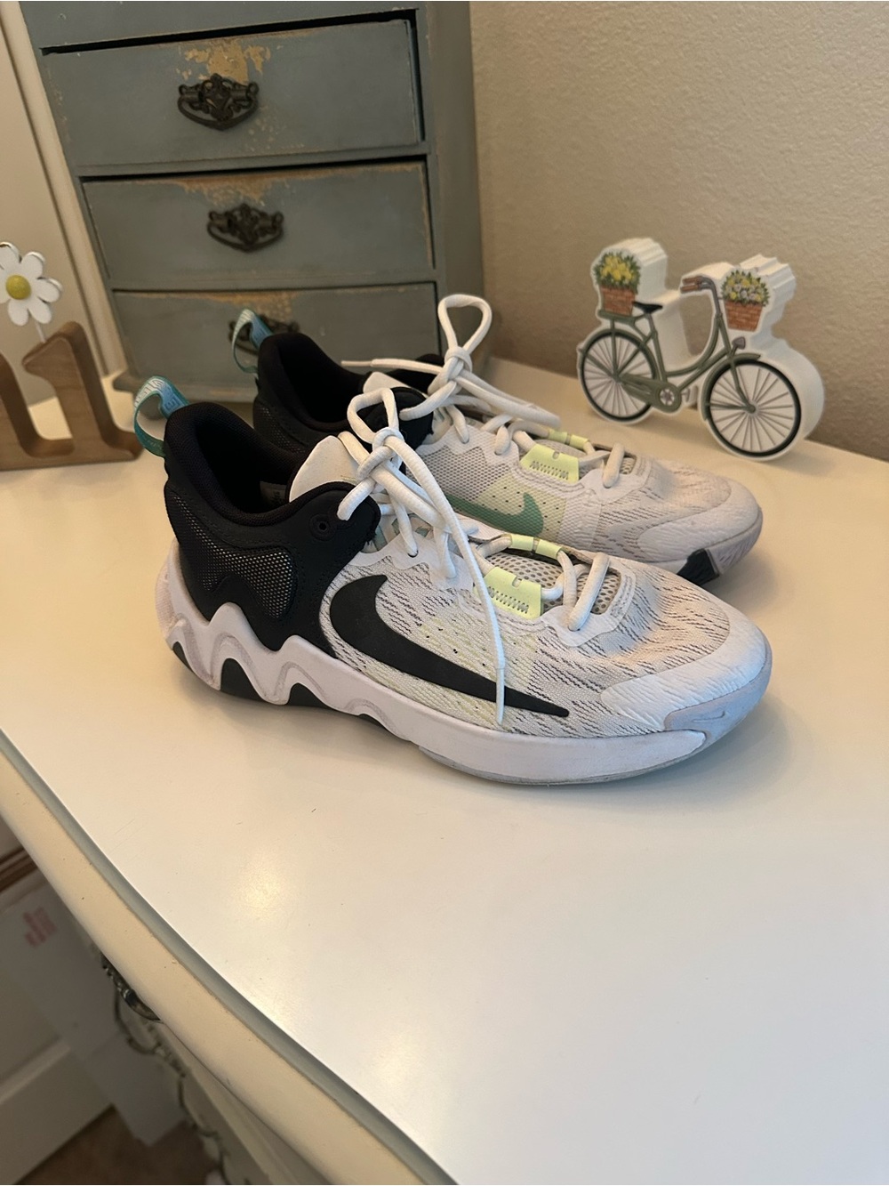 Nike Kids White Sneakers with Black Swoosh and Lime Accents